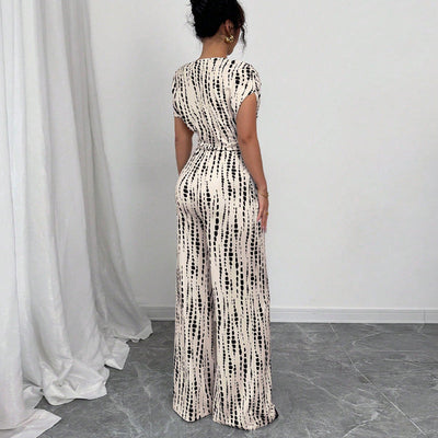 Kendi | Classy Wide-Leg Oblique Strap Jumpsuit